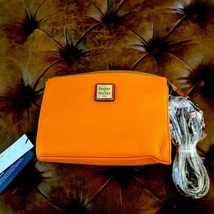 Small bright orange crossbody bag. Great for your spring or a sweet young girl!